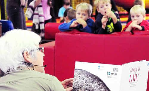 Judy Atkinson reads Edward the Emu to young shoppers in the Palm Centre. Judy Atkinson reads Edward the Emu to young shoppers in the Palm Centre.